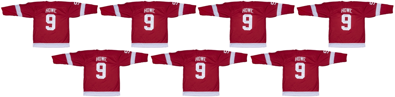 Lot of (7) Gordie Howe Signed Detroit Red Wings Red Jerseys (PSA/DNA)